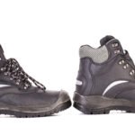 Black man's boots with gray bar. black-man-s-boots-with-gray-bar